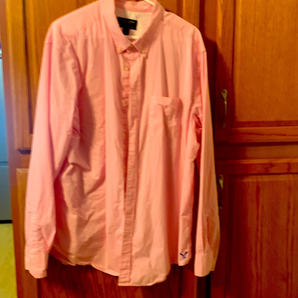 Gently used American eagle, pink and white pinstripe shirt size XXL
